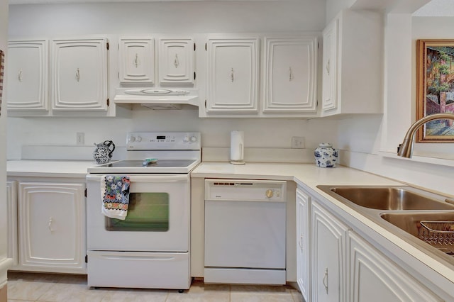 kitchen with white cabinetry, sink, light tile patterned floors, and white appliances