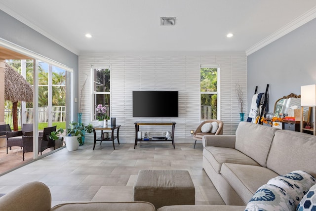 living room with ornamental molding