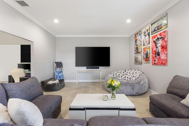 living room featuring crown molding