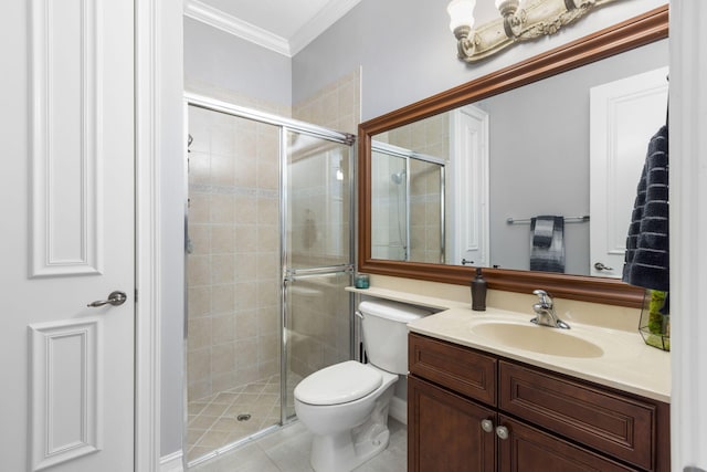 bathroom featuring tile patterned flooring, toilet, crown molding, a shower with shower door, and vanity