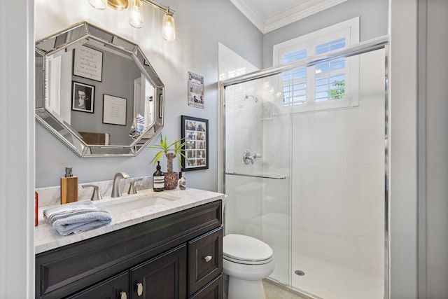 bathroom featuring an enclosed shower, vanity, toilet, and crown molding