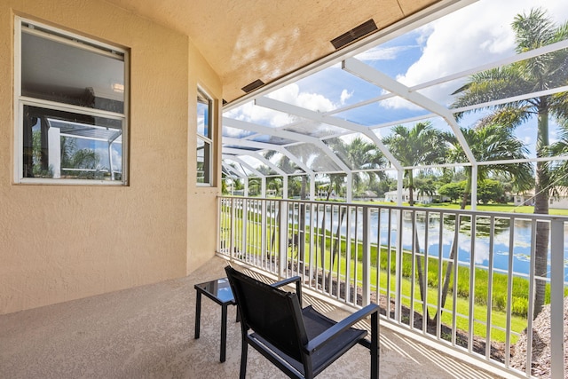 sunroom with a water view