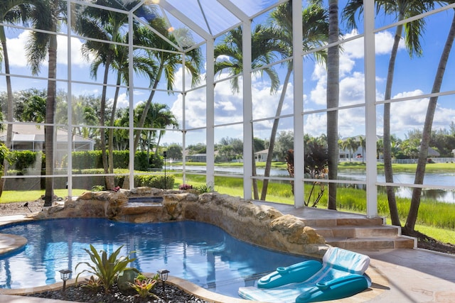 view of swimming pool featuring a water view and a lanai