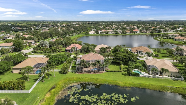 drone / aerial view with a water view