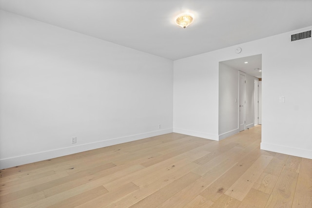 unfurnished room featuring light hardwood / wood-style flooring