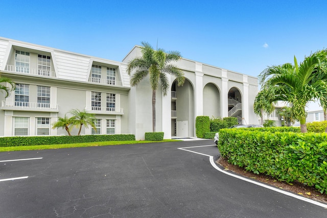 2185 Ibis Isle Rd Unit 10, Palm Beach, FL 33480 - view of building exterior featuring uncovered parking