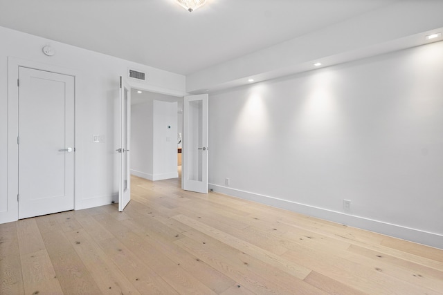 unfurnished bedroom featuring light hardwood / wood-style floors