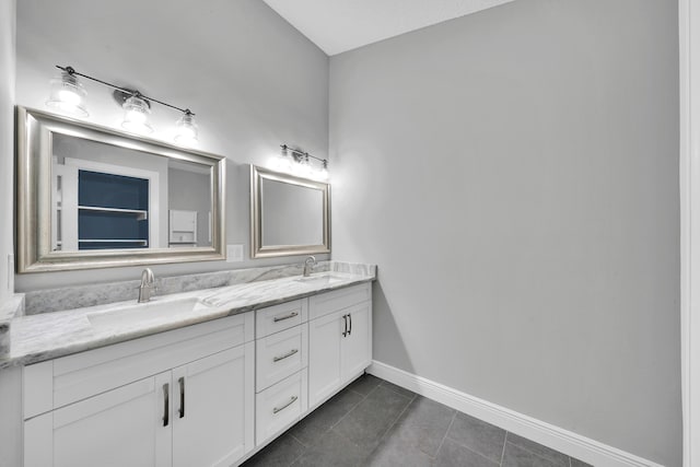 bathroom featuring tile patterned floors and vanity