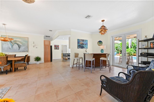 living room featuring french doors, light tile patterned floors, and ornamental molding