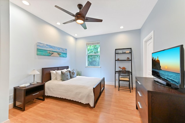 bedroom featuring light wood-type flooring and ceiling fan