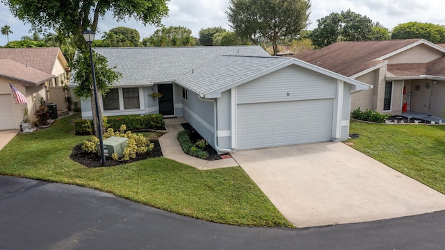 14 Grange Pl, Boynton Beach, FL 33426 - ranch-style home featuring an attached garage, a front yard, concrete driveway, and cooling unit