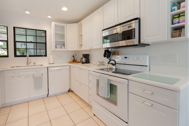 14 Grange Pl, Boynton Beach, FL 33426 - kitchen with white appliances, open shelves, a sink, white cabinetry, and light countertops