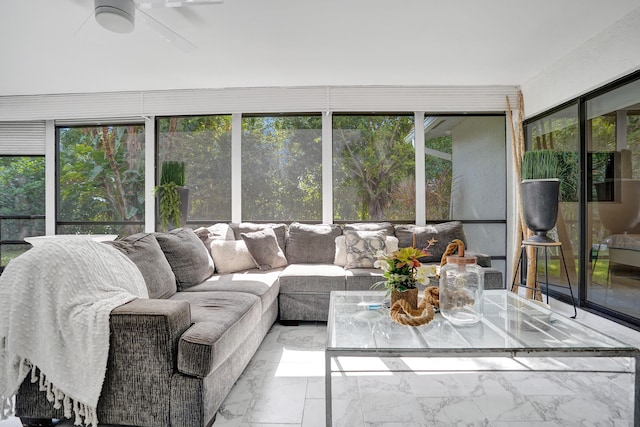 sunroom with ceiling fan