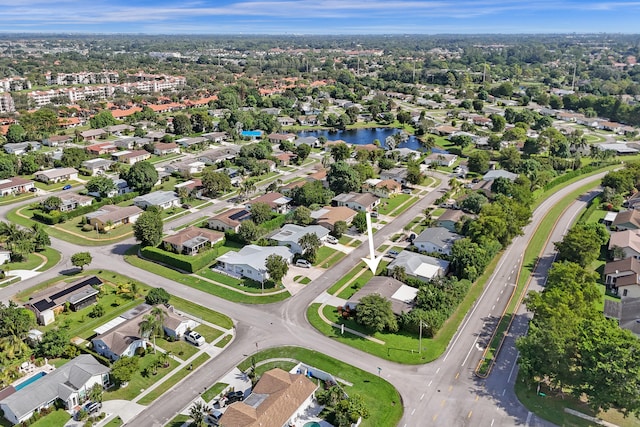 drone / aerial view with a water view