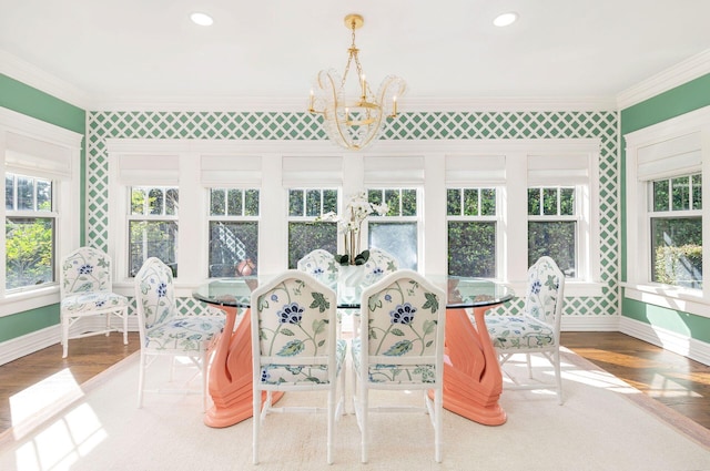 sunroom with a chandelier and plenty of natural light