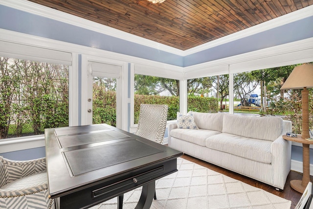 sunroom featuring wooden ceiling