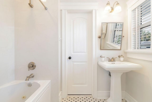 bathroom featuring a washtub