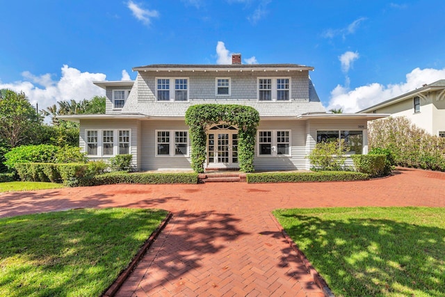 view of front of property with a front lawn