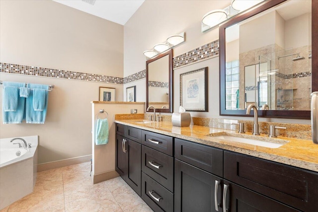 bathroom with vanity, tile patterned floors, and independent shower and bath