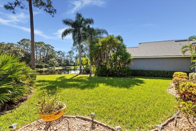 view of yard with a water view