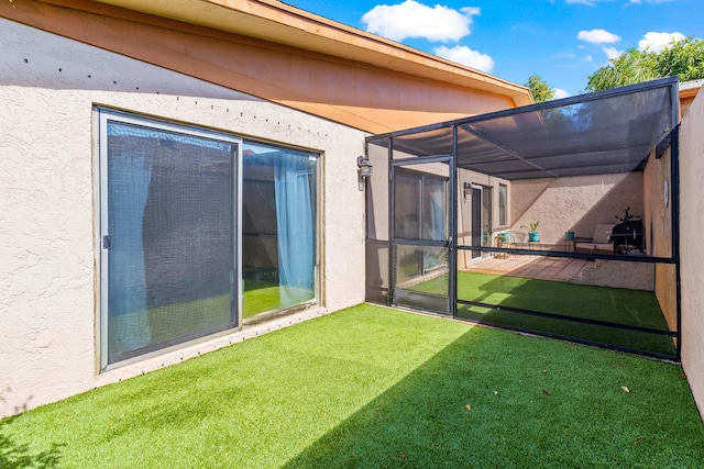 view of yard with a lanai