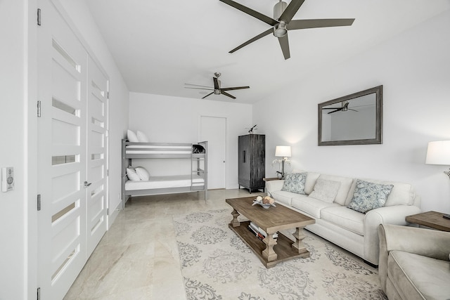 living room with ceiling fan and light hardwood / wood-style flooring