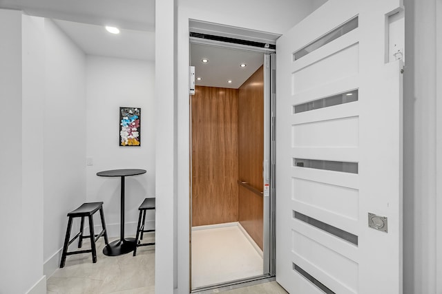 interior space featuring tile patterned flooring