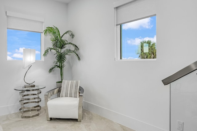 sitting room featuring plenty of natural light