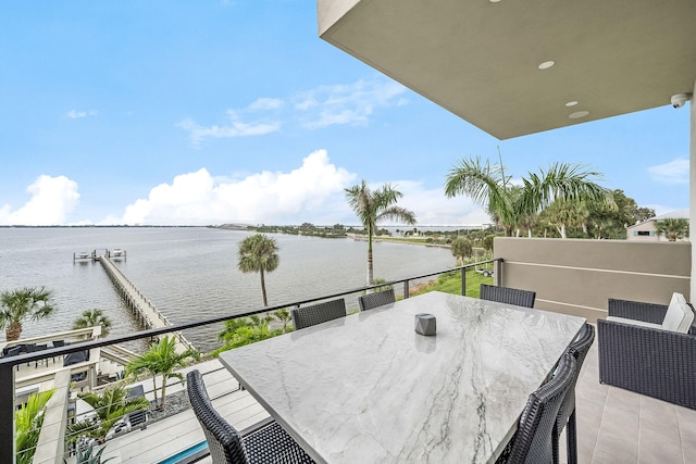 balcony featuring a water view