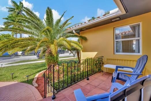 view of patio / terrace with a balcony