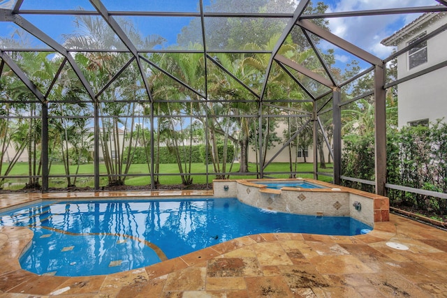 view of pool featuring a patio, an in ground hot tub, and a lanai