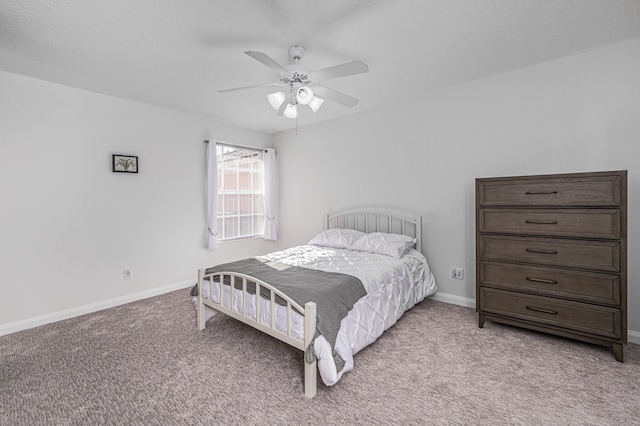 bedroom with light colored carpet and ceiling fan