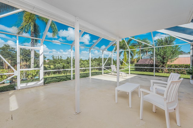 view of patio / terrace featuring a lanai