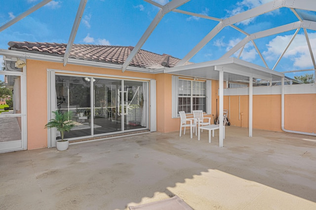 unfurnished sunroom with vaulted ceiling