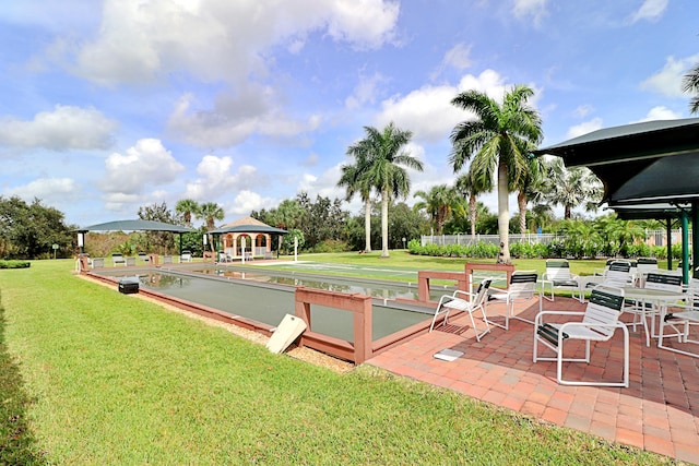 view of home's community featuring a gazebo and a lawn