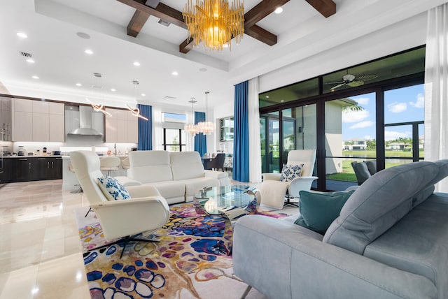 living room with light tile patterned floors, visible vents, beamed ceiling, ceiling fan with notable chandelier, and recessed lighting