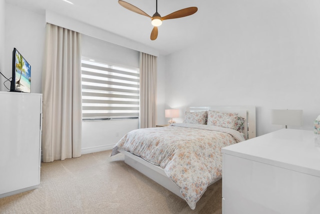 bedroom featuring carpet flooring and a ceiling fan