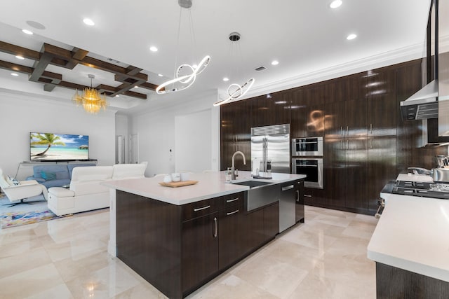 kitchen featuring appliances with stainless steel finishes, light countertops, coffered ceiling, and modern cabinets