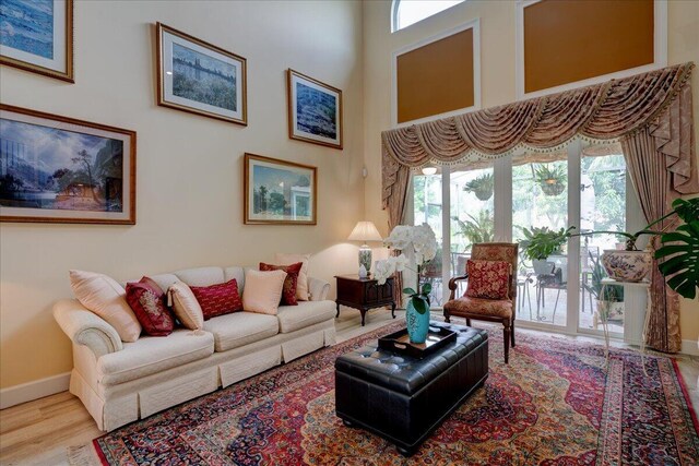 9863 Royal Cardigan Way, West Palm Beach, FL 33411 - living area with baseboards and wood finished floors