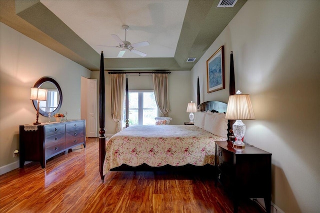 bedroom featuring hardwood / wood-style floors and ceiling fan