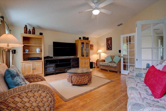 9863 Royal Cardigan Way, West Palm Beach, FL 33411 - living area with ceiling fan, light wood finished floors, and vaulted ceiling