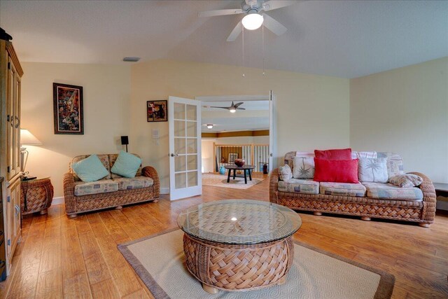 9863 Royal Cardigan Way, West Palm Beach, FL 33411 - living area with light wood-type flooring, a ceiling fan, and baseboards