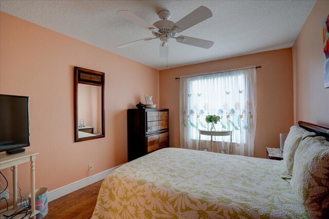 9863 Royal Cardigan Way, West Palm Beach, FL 33411 - bedroom featuring wood finished floors and a ceiling fan