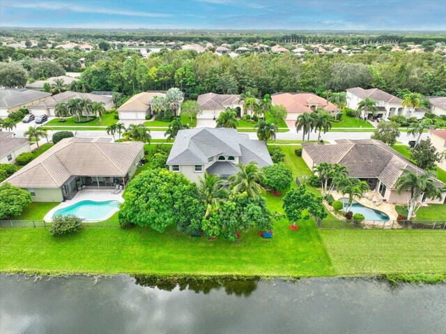 9863 Royal Cardigan Way, West Palm Beach, FL 33411 - aerial view of residential area featuring a pool and a large body of water