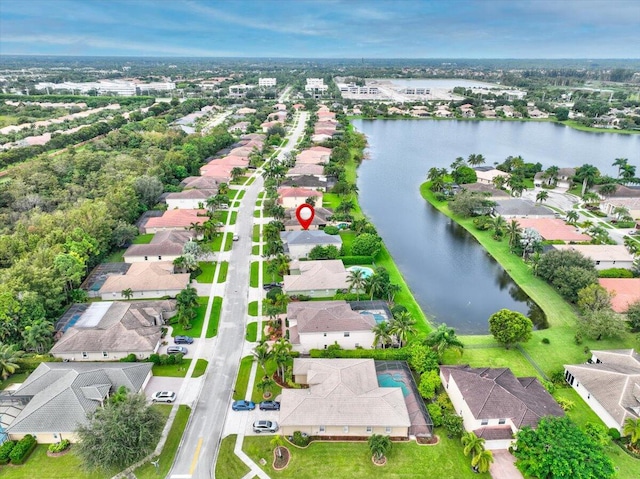 bird's eye view with a water view