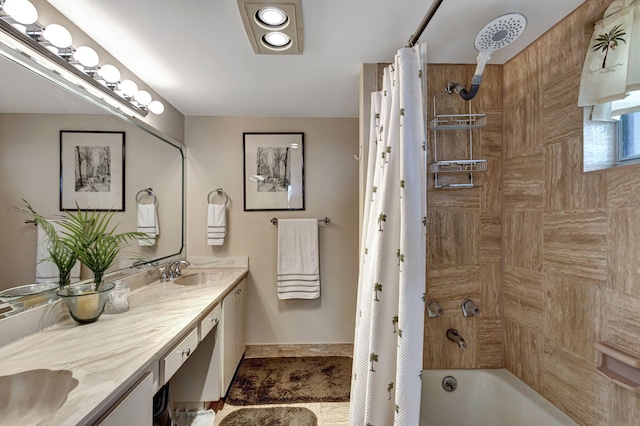 bathroom with vanity and shower / bath combination with curtain