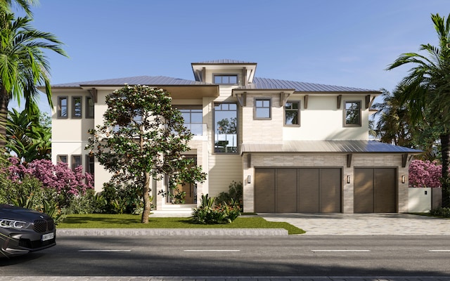 view of front of home with a garage