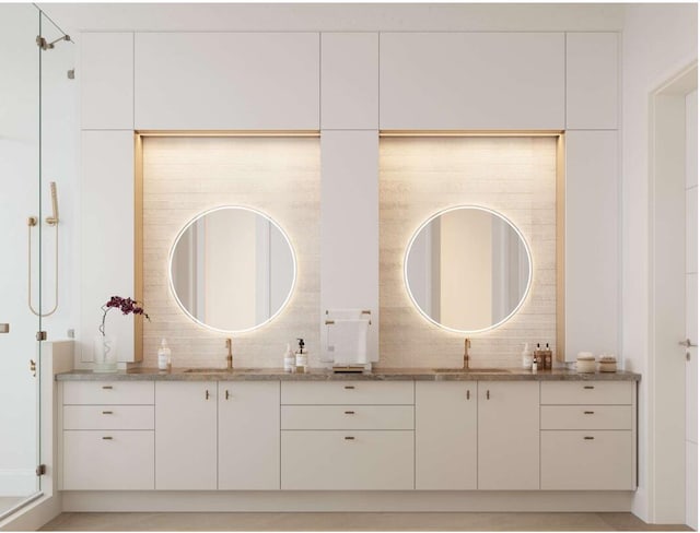 bathroom featuring backsplash and vanity