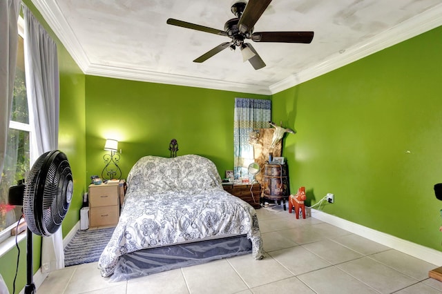 tiled bedroom featuring ceiling fan and crown molding