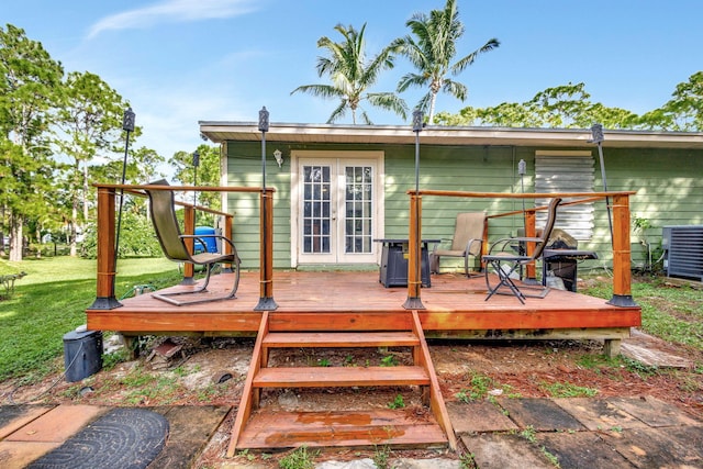 deck with central air condition unit and a lawn